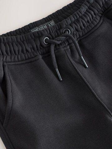 Tapered Pantaloni de la Next pe negru