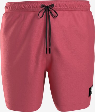 Calvin Klein Swimwear Board Shorts in Pink: front