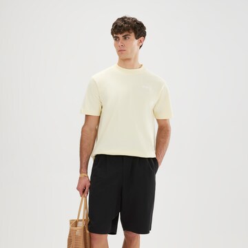 ELLESSE Shirt in Yellow: front