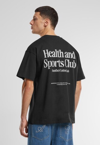 T-Shirt 'Health and Sports Club' Another Cotton Lab en noir : devant