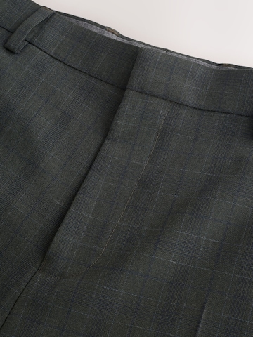 Slimfit Pantaloni con piega frontale 'Motionflex' di Next in verde