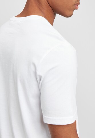 T-Shirt 'Unwind 2.0' FILA en blanc