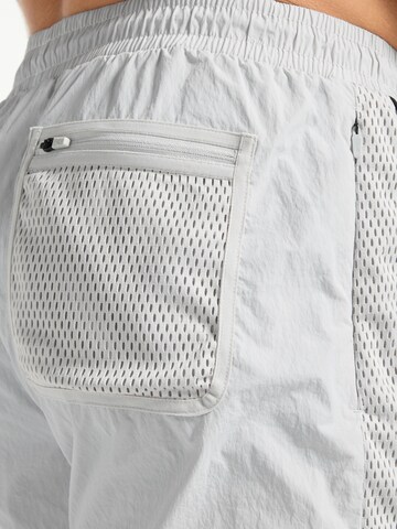 A-Game - Loosefit Calças de desporto em cinzento