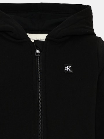 Calvin Klein Kids Sweatjacka 'MINI BADGE ZIP THROUGH' i svart