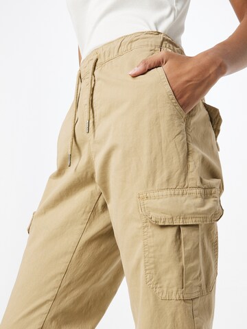 Tapered Pantaloni cargo di Urban Classics in beige