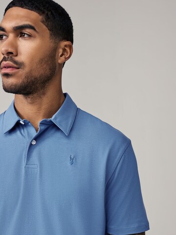 Next - Camiseta en azul