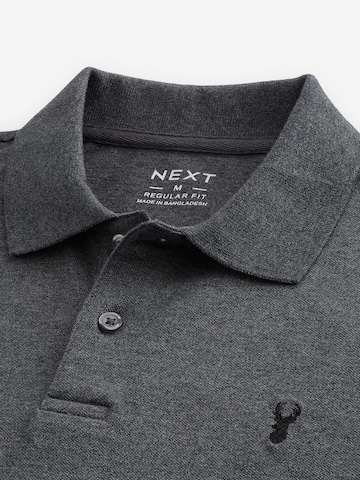 Maglietta di Next in grigio