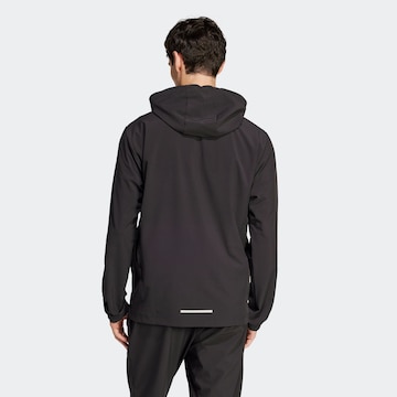 ADIDAS SPORTSWEAR - Chaqueta de chándal en negro