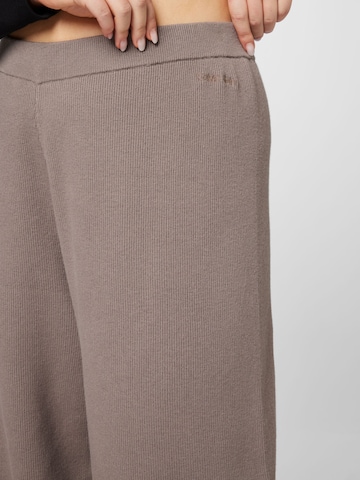 Calvin Klein Curve Široke hlačnice Hlače | rjava barva