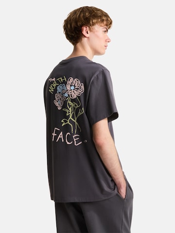 THE NORTH FACE Póló 'FLOWER SCRIBBLE' - fekete