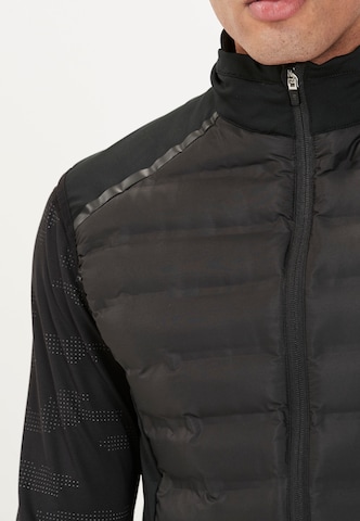 ENDURANCE Sportbodywarmer 'MIDAN M' in Zwart