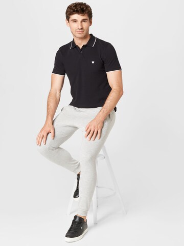 WRANGLER Poloshirt in Schwarz