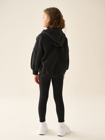 Next - Conjunto en negro