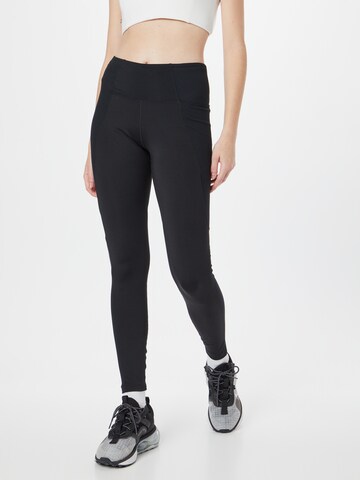 NIKE Skinny Workout Pants in Black: front