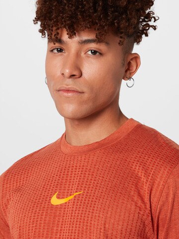 NIKE Sportshirt 'Pro' in Orange