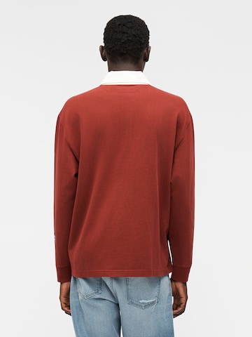 Tricou de la Abercrombie & Fitch pe roșu