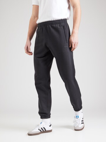 ADIDAS ORIGINALS Tapered Trousers 'ESS' in Black: front