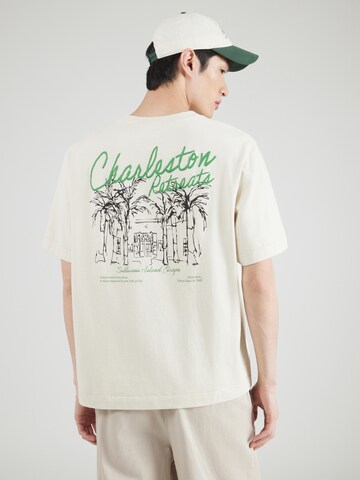 T-Shirt 'WELLNESS DESTINATIONS' Abercrombie & Fitch en gris : devant