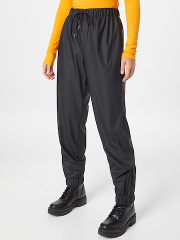 RAINS Tapered Trousers in Black: front