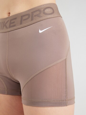 NIKE Скинни Спортивные штаны в Коричневый