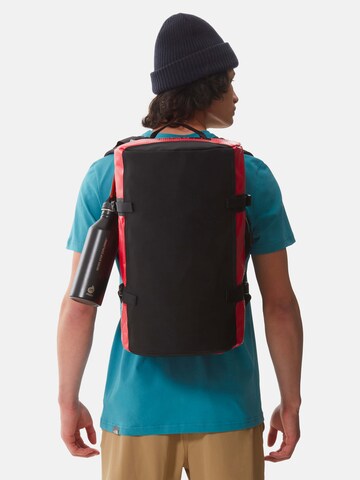 THE NORTH FACE - Bolsa de viaje en rojo