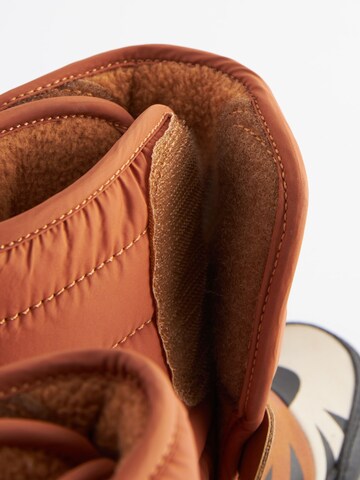 Next Snowboots in Orange