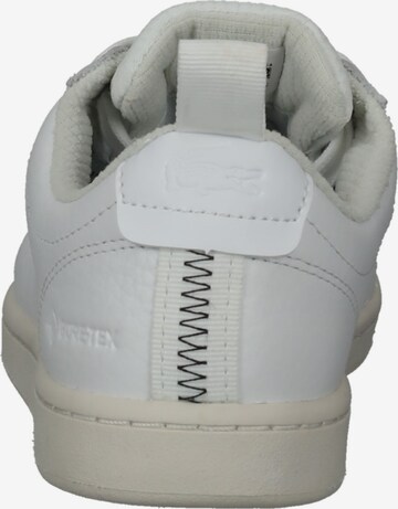 Baskets basses LACOSTE en blanc