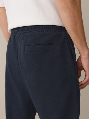 Tapered Pantaloni di Next in blu