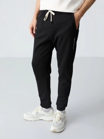 Tuta da jogging di Tommy Life in beige