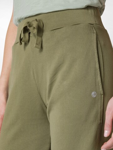Tapered Pantaloni sportivi di DEHA in verde