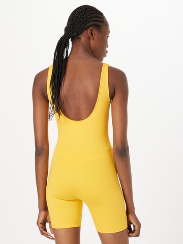 Girlfriend Collective Athletic Bodysuit in Yellow