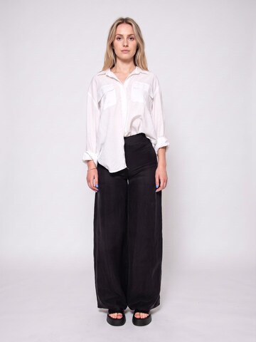 wild pony Baggy Hose 'BLACK FLOWY TROUSERS'‌‌‌‌‌‌‌‌ in Schwarz: Vorderseite