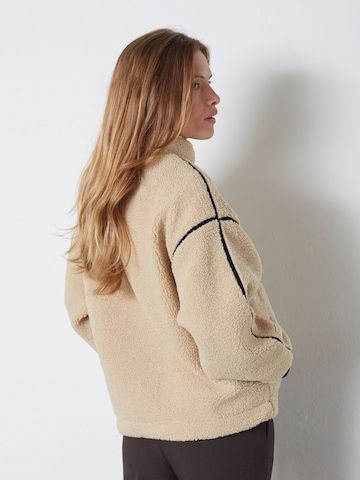 Pull-over 'Madin' co'couture en beige