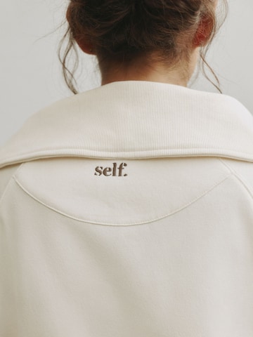 Sweat-shirt self. en beige