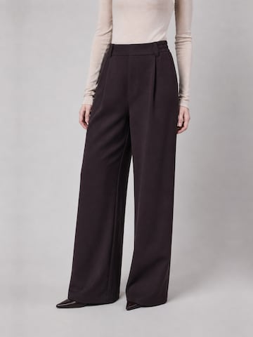 OWN Off With Nature - Loosefit Calças 'Pantalone Palazzo Loose Fit in Interlock Wood' em castanho: frente