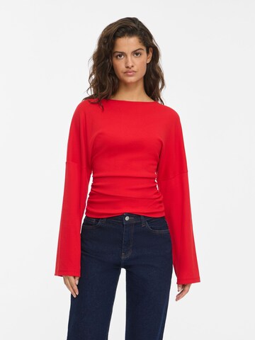 Noisy may Shirts i rød: forside