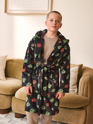 melns Next Peldmētelis