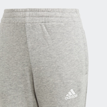 ADIDAS SPORTSWEAR - Fato de treino 'Essentials' em azul