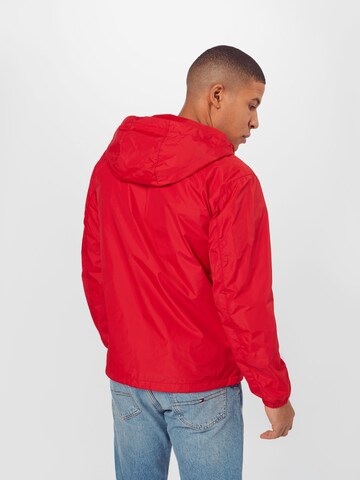 Veste mi-saison Tommy Jeans en rouge