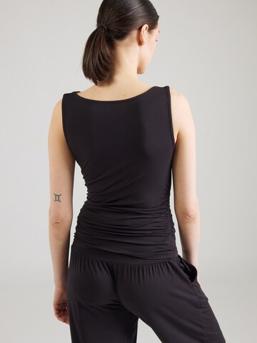 Top sportivo di CURARE Yogawear in nero