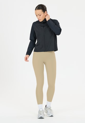 Athlecia Skinny Workout Pants 'Aliya V2' in Brown