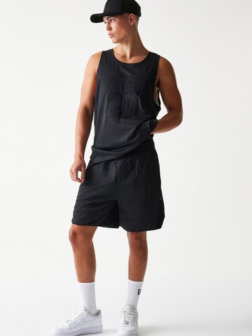 NEW ERA Loosefit Bukser i sort