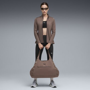 PUMA Sports sweat jacket 'Strong' in Brown