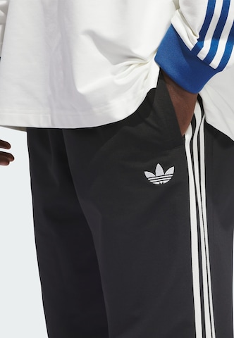 Loosefit Pantalon ADIDAS ORIGINALS en noir
