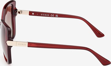 Lunettes de soleil GUESS en rouge