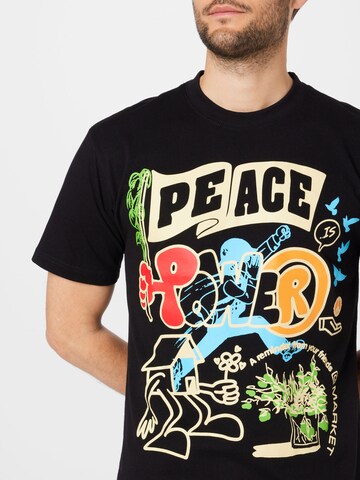 Tricou 'PEACE AND POWER' de la MARKET pe negru