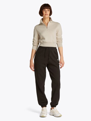 Tommy JeansSweater majica - bež boja