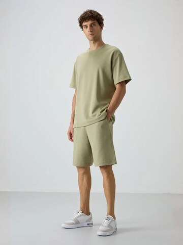 Tommy Life Pants in Green: front