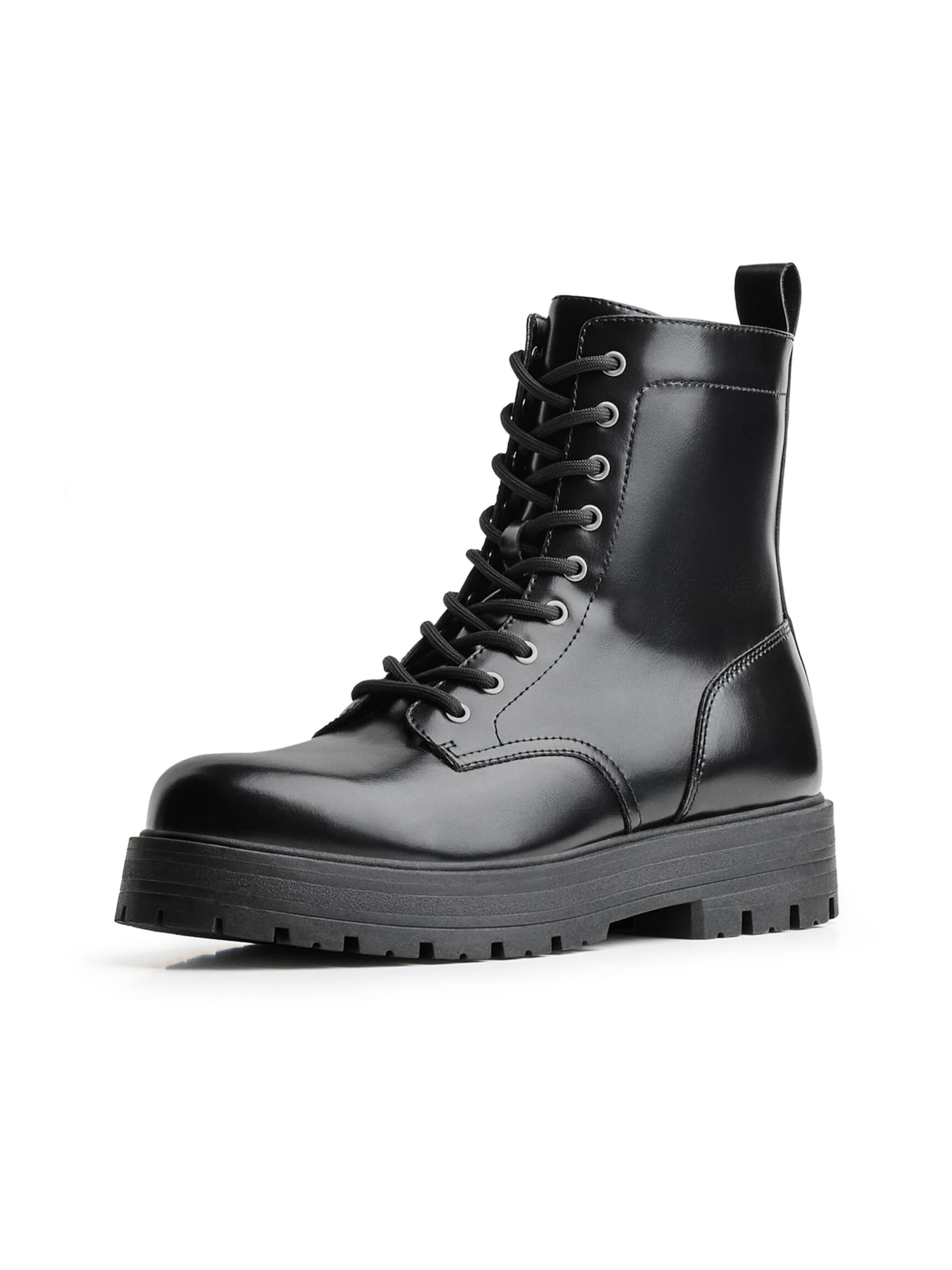 Bottines à lacets Bershka en noir : devant