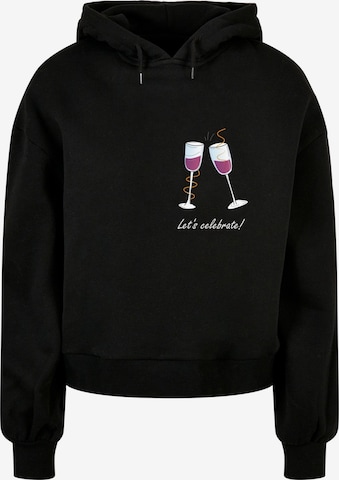 Sweat-shirt 'Let´s celebrate' Merchcode en noir : devant